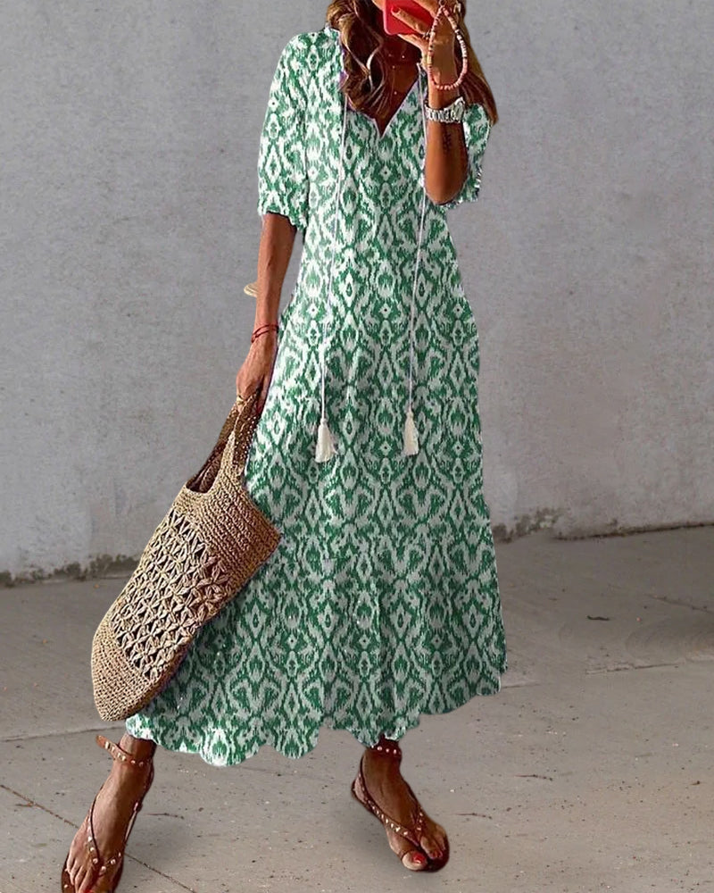 GracePrint | Lange jurk met print, V-hals en halve mouwen