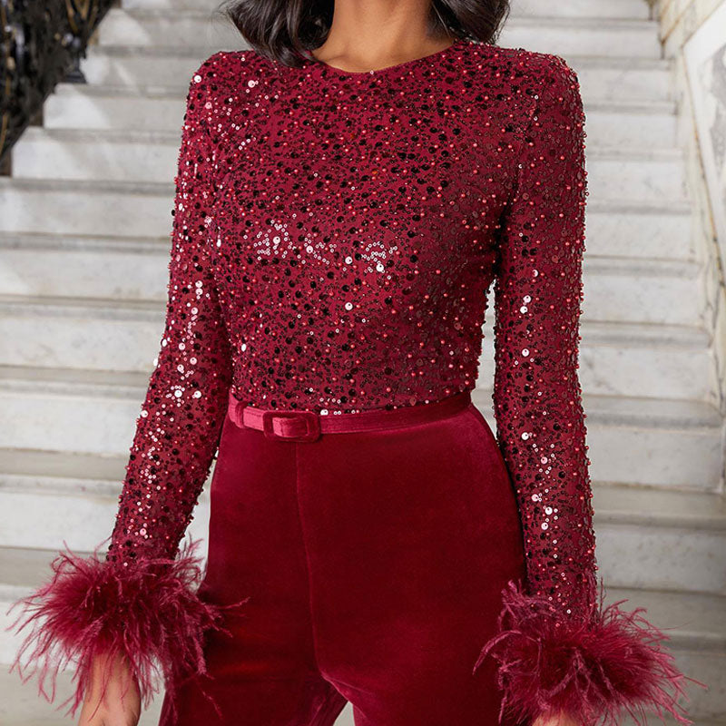 Glaventa | Jumpsuit met gevederde glamour