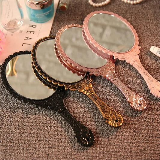 VintageMirror | Vintage gebeeldhouwde handspiegel